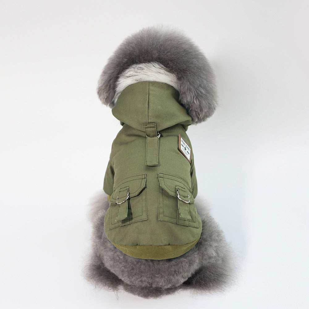 Green dog coat with fur hood on a white background