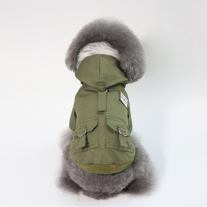 Green dog coat with fur hood on a white background